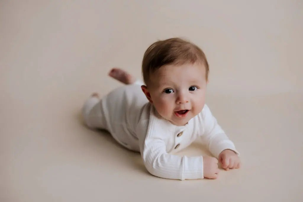 Three Little Tots White Baby Ribbed Playsuit with pockets - 