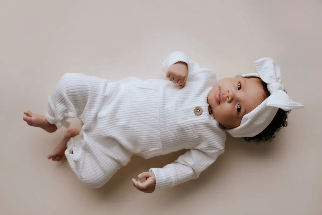 Three Little Tots White Baby Ribbed Playsuit with pockets - 