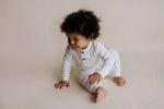 Three Little Tots White Baby Ribbed Playsuit with pockets - 