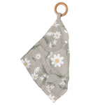 Bamboo mini blankie with white daisy print attached to a round wooden teething ring