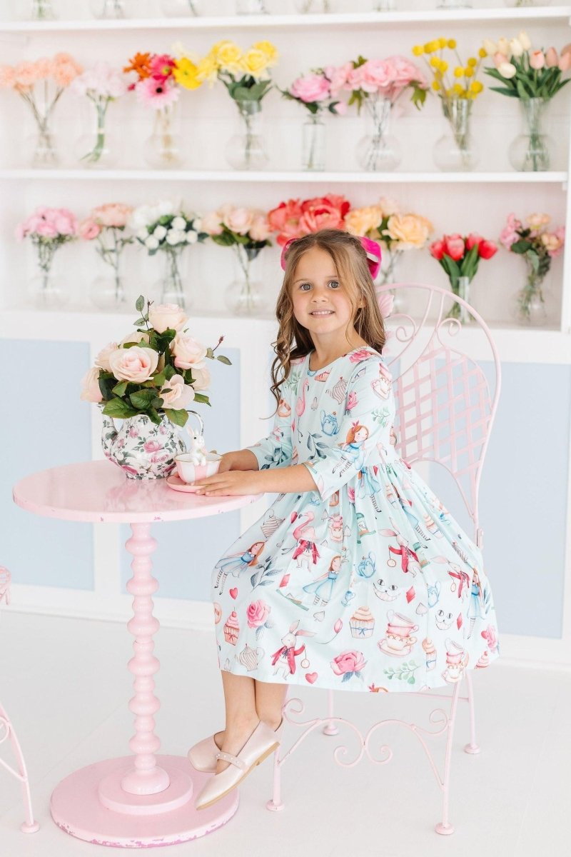 Wonderland Three Quarter Sleeve Twirl Dress With Pocket - Everetts Place Boutique - Twirl Pocket Dress 3/4