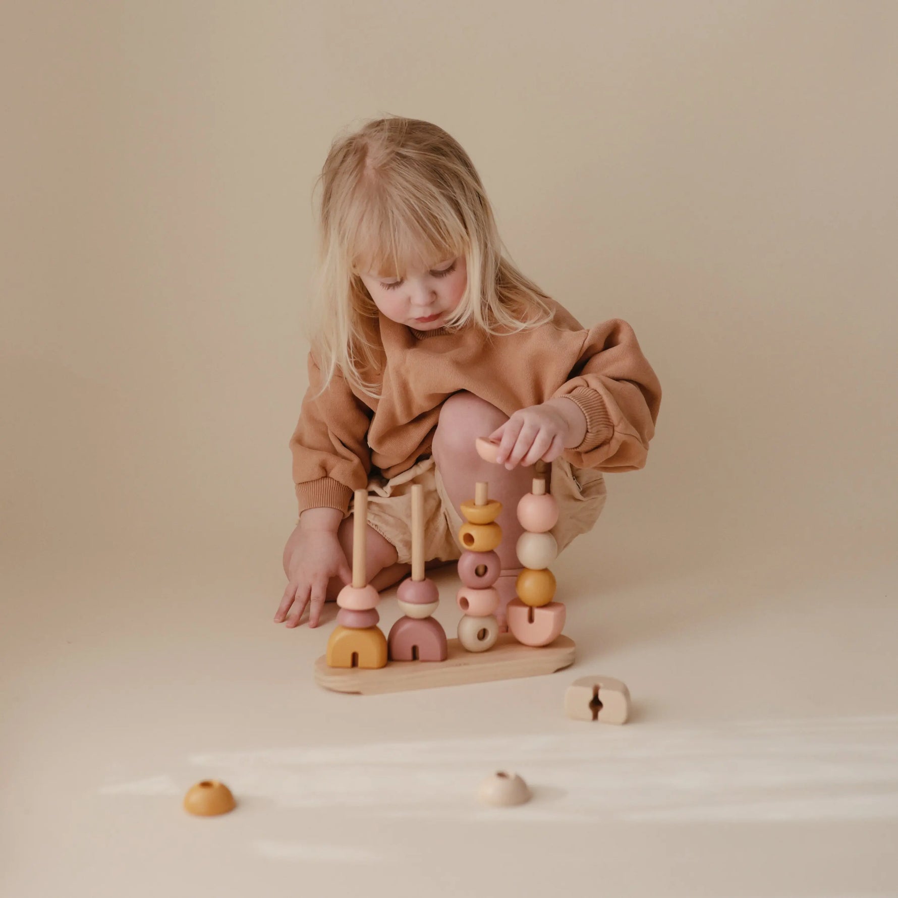 Mushie Wooden Multi Shape Stacker Educational Toy for Kids with 20 Shapes and Non Toxic Paint - Toys & Games > Toys > Building Toys > Wooden Blocks Wooden Multi Shape Stacker
