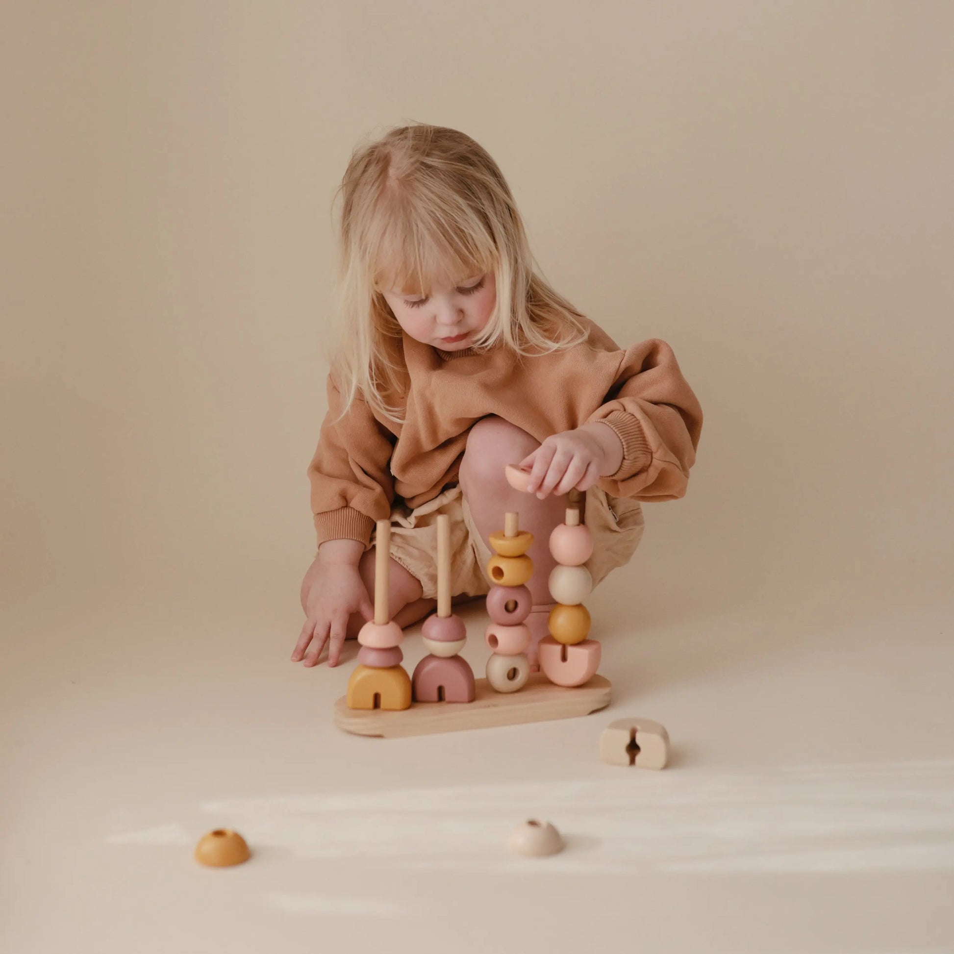 Wooden Multi Shape Stacker Educational Toy for Kids with 20 Shapes and Non Toxic Paint Mushie Everetts Place: Online Boutique