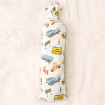 Bamboo swaddle blanket with a busy builders construction print of trucks and tools