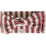 Ribbed bamboo baby head wrap in red and white stripes with a knotted bow front