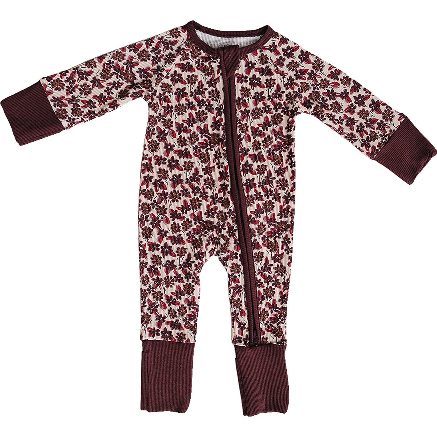 Footed baby pajamas in antique floral print on neutral bamboo fabric with a full-length zipper and cuffed feet.