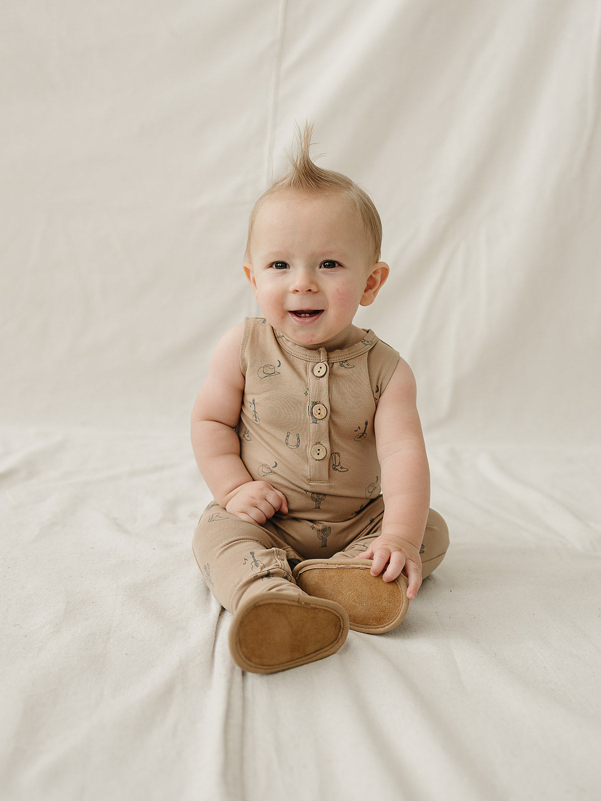 Mebie Baby organic cotton western tank romper for baby, featuring a cute western print.