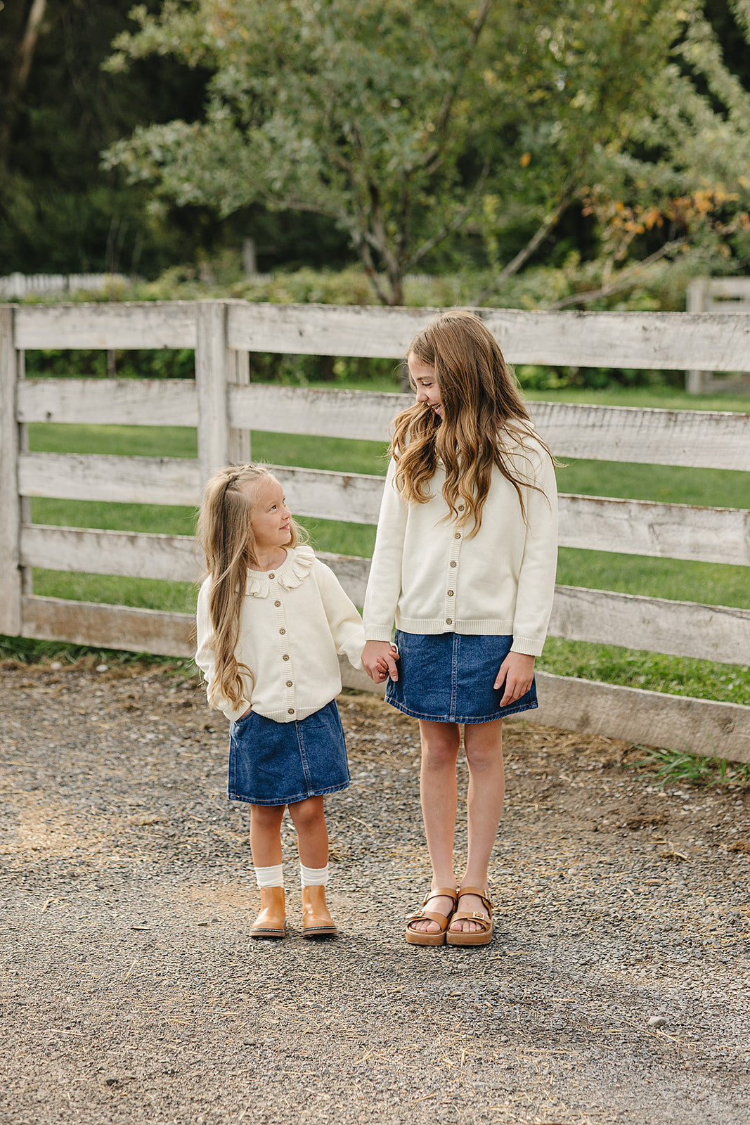 Cream Ruffle Knit Cardigan by Mebie Baby