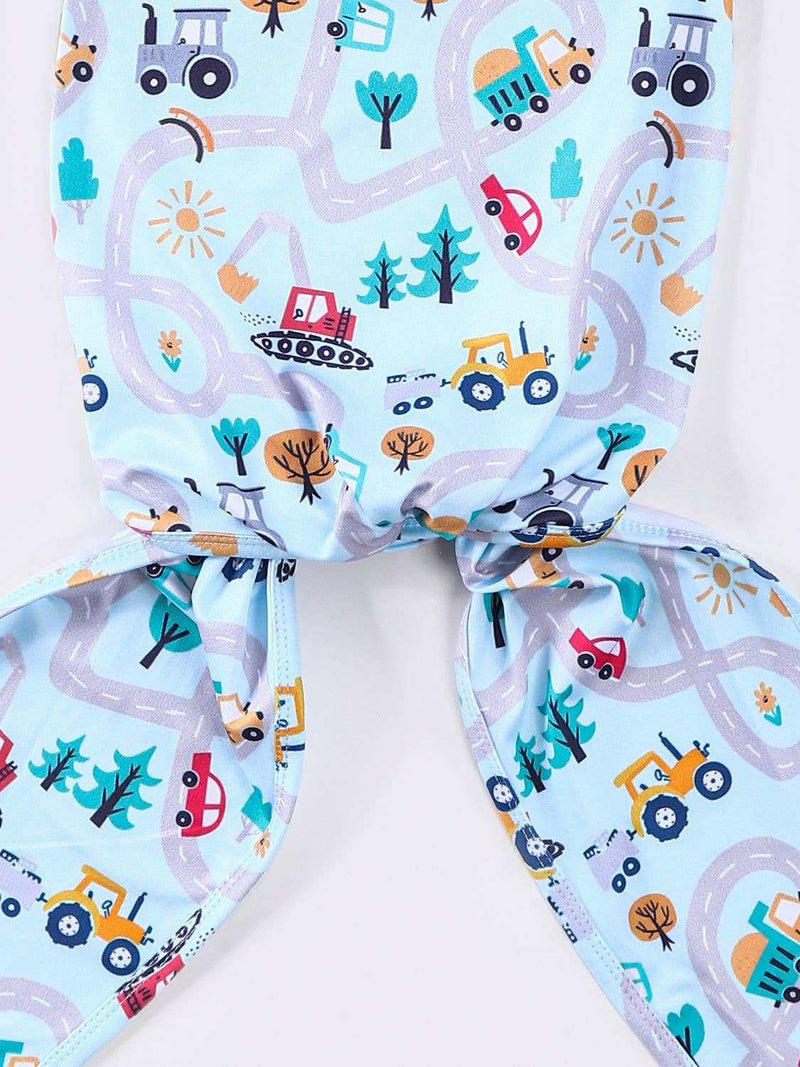 Clover Cottage baby knotted gown with matching hat, featuring playful town-themed design for newborns to 3 months.