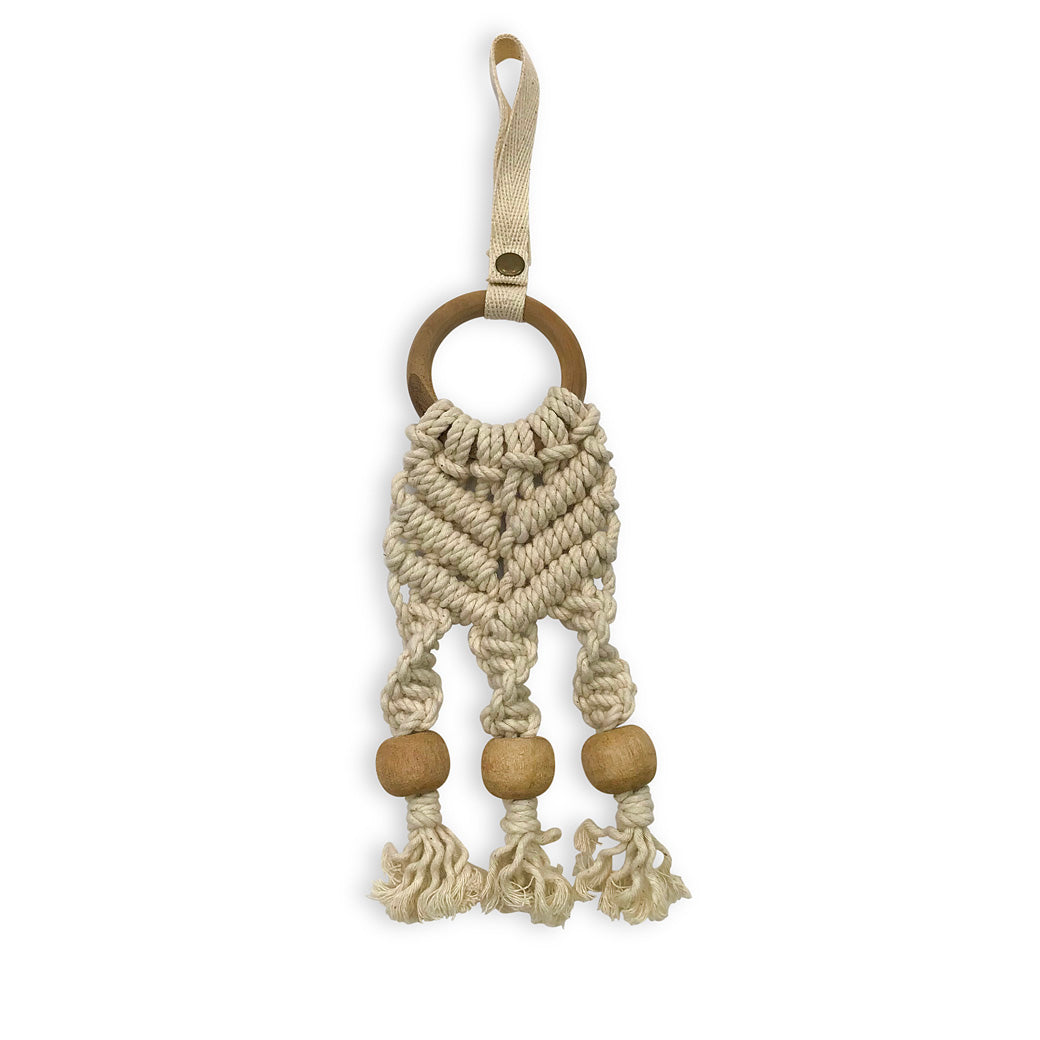 Modern Nursery natural wooden baby play gym with hanging toys for baby development.