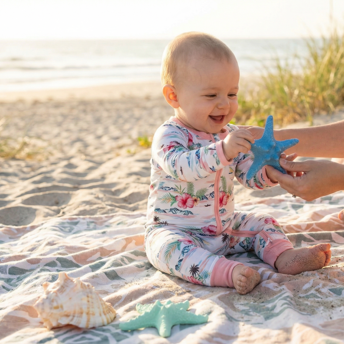 Baby convertible coverall in Aloha print with two-way zipper and convertible feet