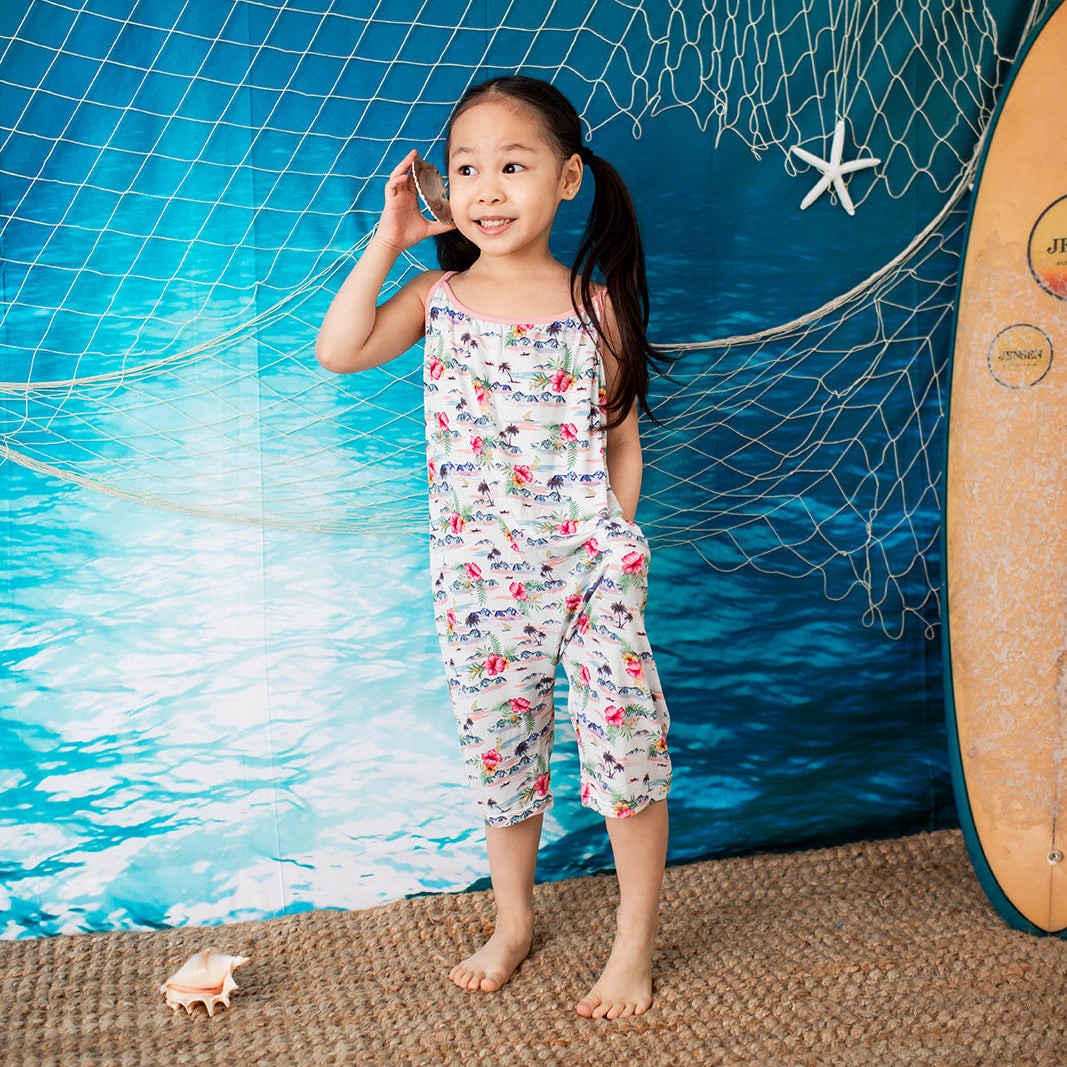 Toddler jumpsuit in an Aloha print with pockets, made from bamboo and spandex blend fabric