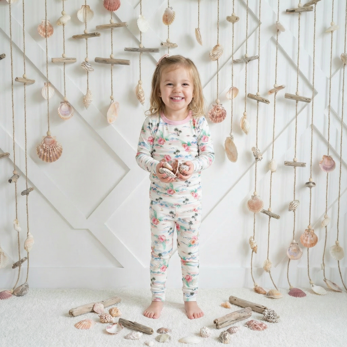 Two-piece long sleeve baby pajama set with matching top and pants in Aloha print