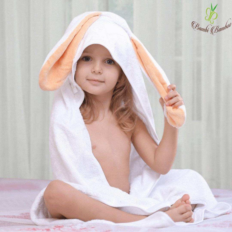 Child wearing Amber Bunny Hooded Towel with ears, 100% organic bamboo, soft and hypoallergenic.