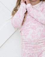 Two-piece long sleeve baby pajama set with matching top and pants