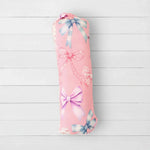 Baby swaddle blanket with a twinkle ties pattern spread flat to show the print