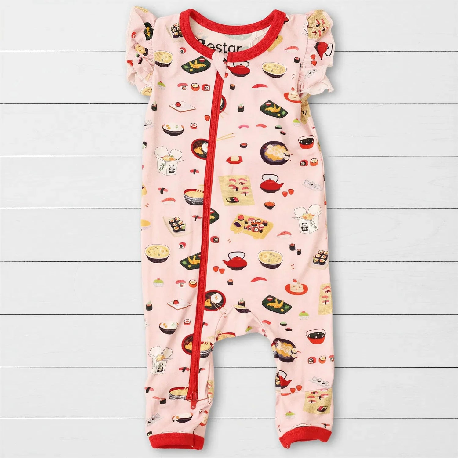 Pink flutter-sleeve baby romper with a sushi-themed print and dual zippers down the front and leg.