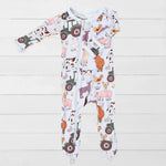 Baby footie pajamas with a farm animal print of pigs, goats and cows, featuring a full-length front zipper.