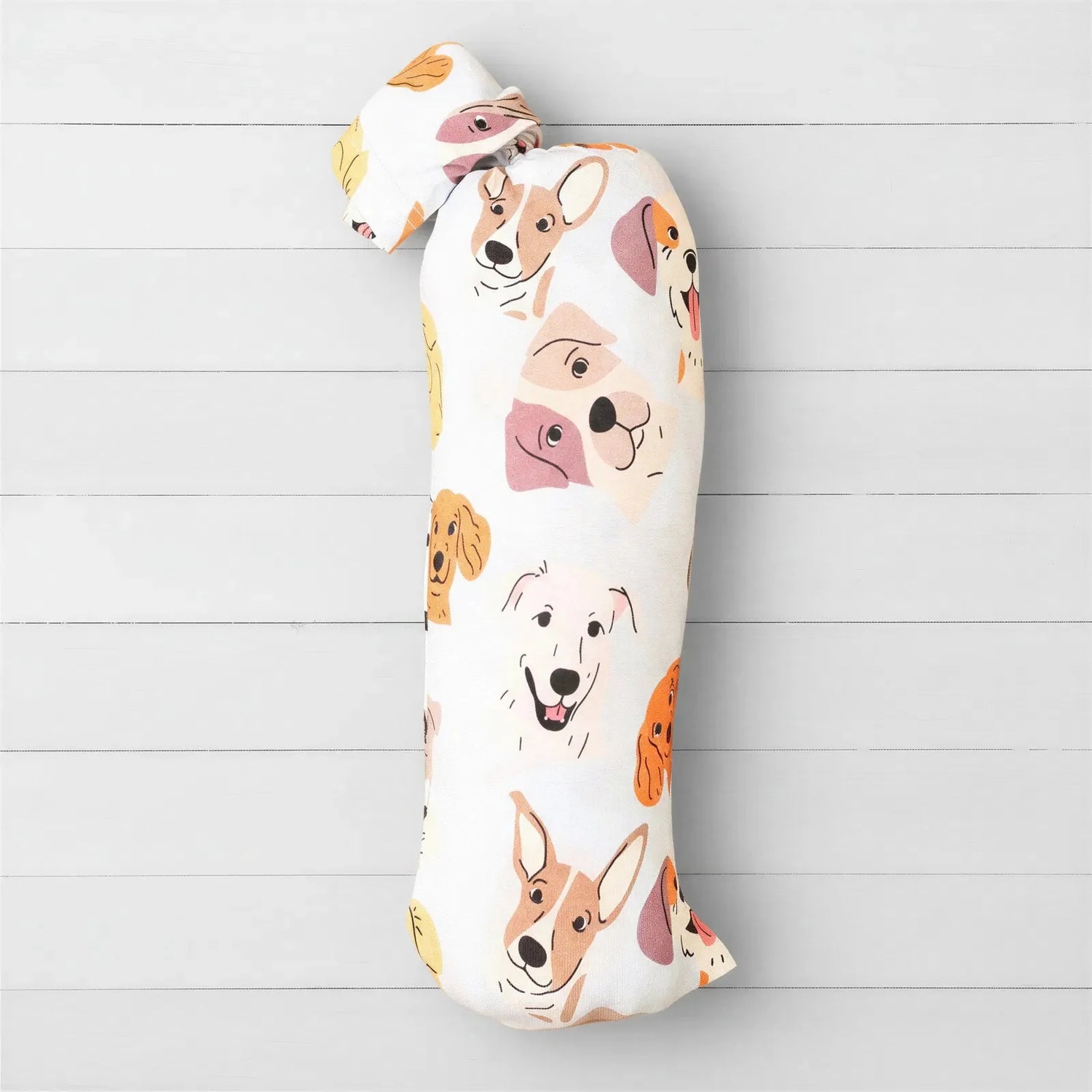 Baby swaddle blanket with a repeating dog print, spread flat to show the pattern