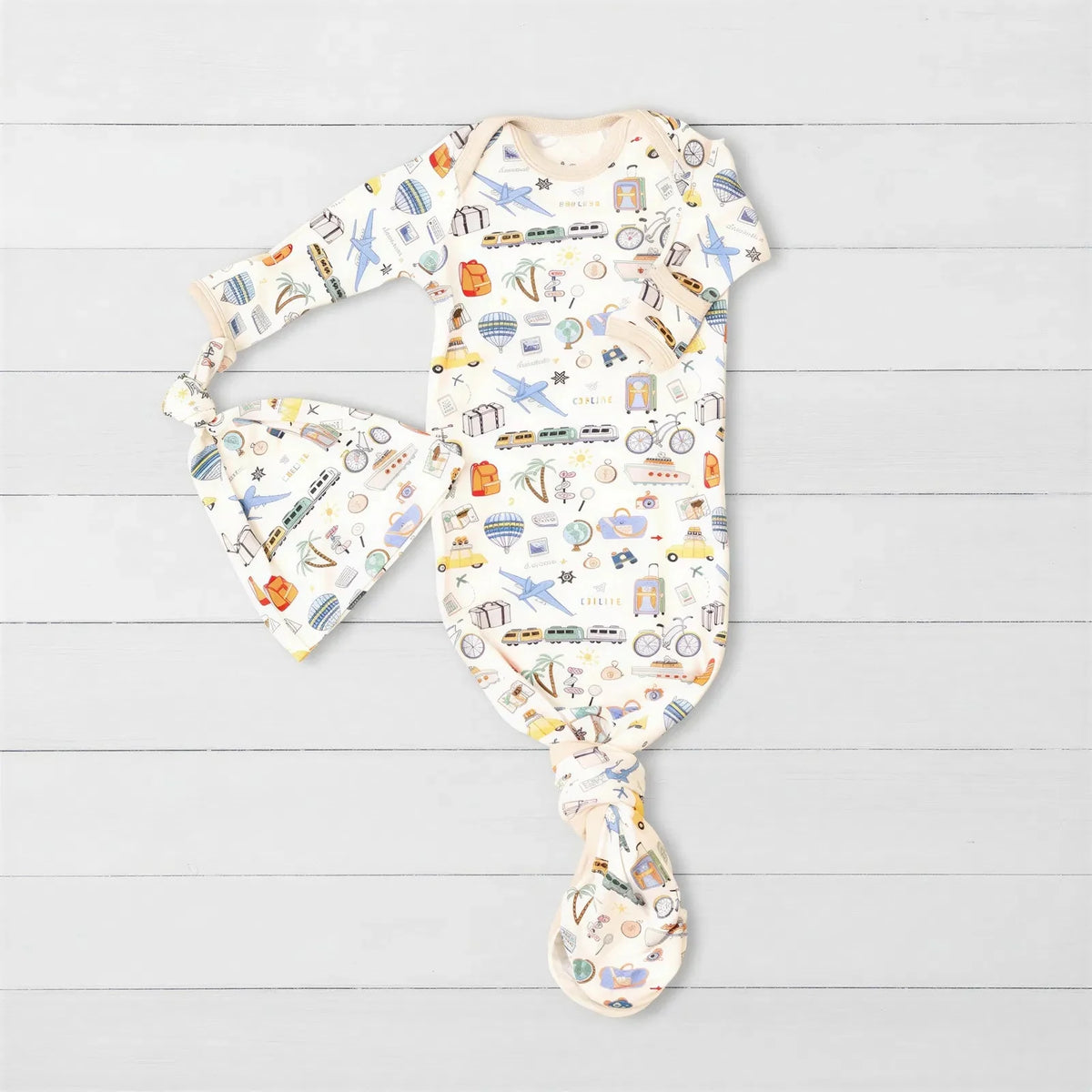 Baby gown and matching hat set in a World Traveler print with fold-over hand mittens