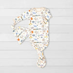 Baby gown and matching hat set in a World Traveler print with fold-over hand mittens