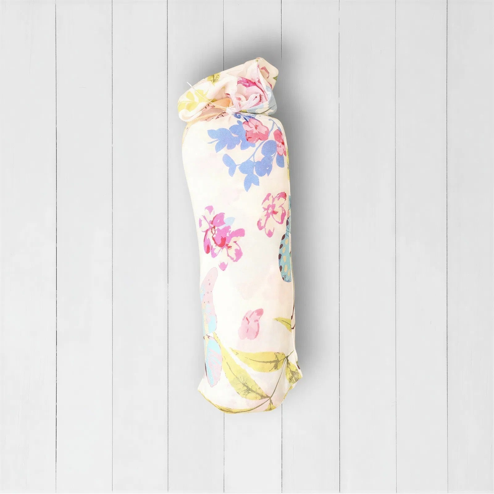 Pink flutter-print baby swaddle blanket laid out flat in a square shape