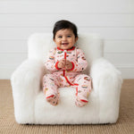 Baby footie pajamas in pink with an all-over sushi print, two-way zipper, and footed legs.