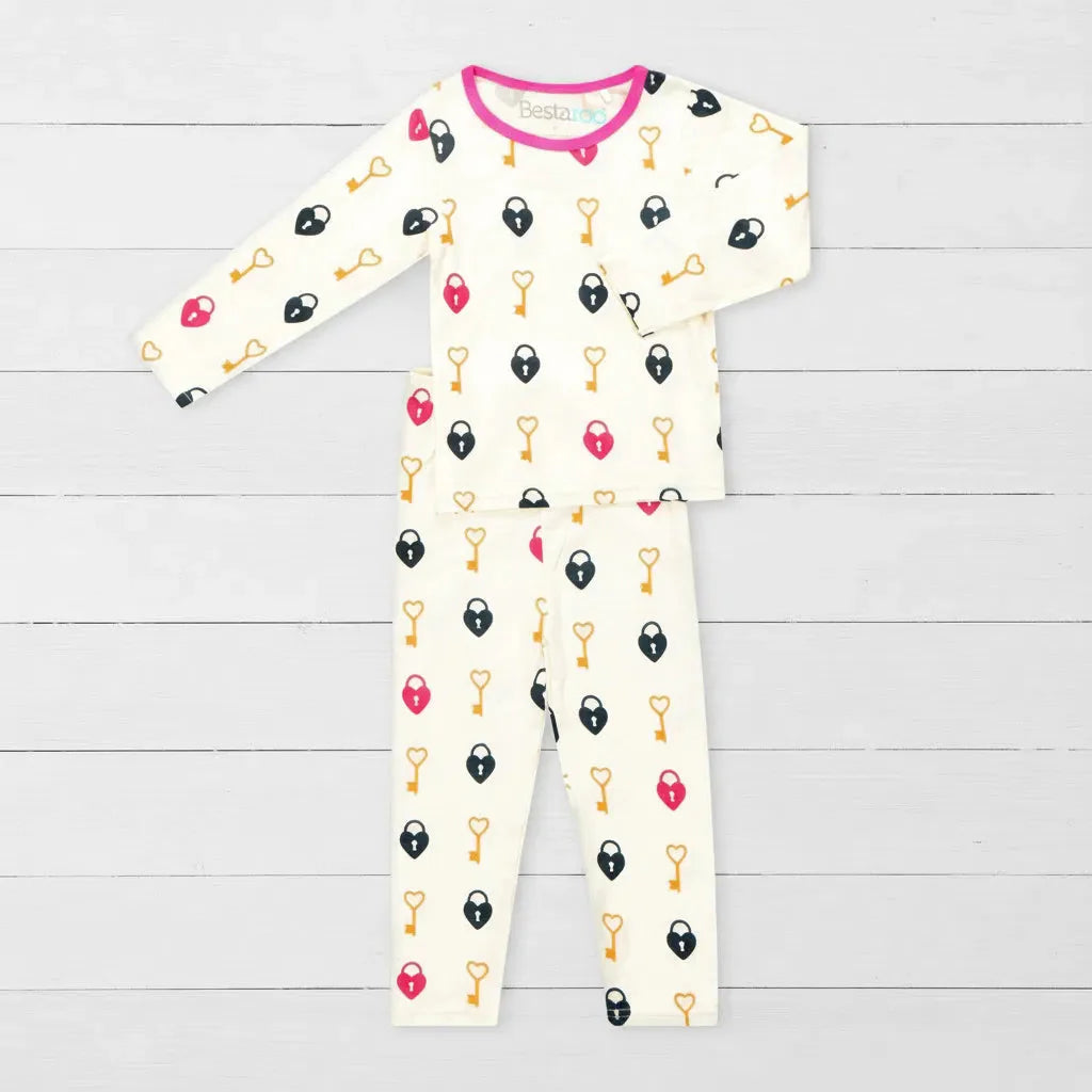 Two-piece baby pajama set with pink key-to-my-heart print, long-sleeve top and matching pants