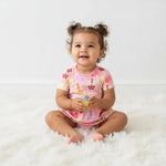Bodysuit dress with boba tea print, short sleeves, and snap closure at the inseam