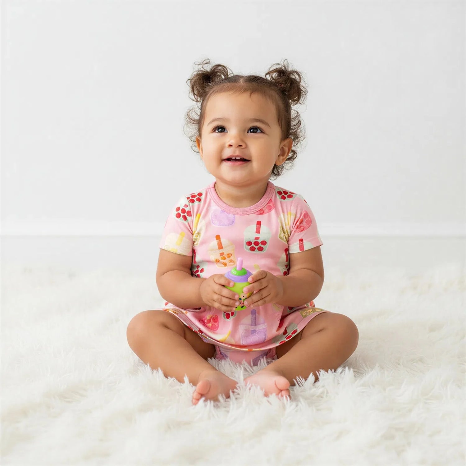 Bodysuit dress with boba tea print, short sleeves, and snap closure at the inseam