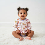 Bodysuit dress with long sleeves in a soft ButterBloom floral print and inseam snap closure