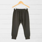 Midnight dark-colored relaxed fit baby joggers with an elastic waist and drawstring