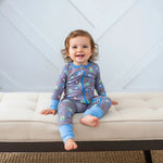 Convertible coverall in a musical Acoustic Dream print, shown with long sleeves and full-length legs.