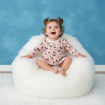 Bow & Boo long-sleeve bodysuit dress with a bow print and snap closure at the inseam