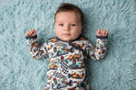 Baby convertible gown and matching hat in the Apex Dreams print, with fold-over mitten cuffs.
