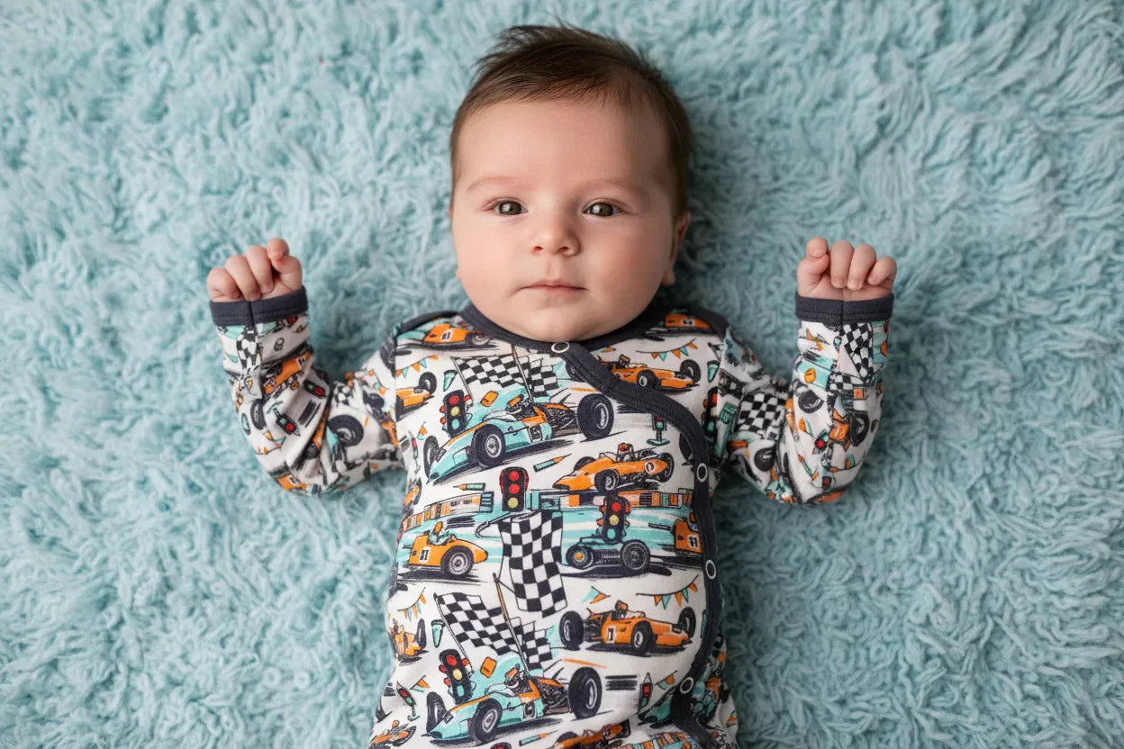 Baby convertible gown and matching hat in the Apex Dreams print, with fold-over mitten cuffs.