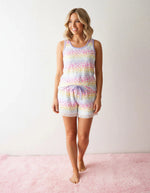 Two-piece womens loungewear set with sleeveless tank top and matching shorts trimmed with lace ruffles
