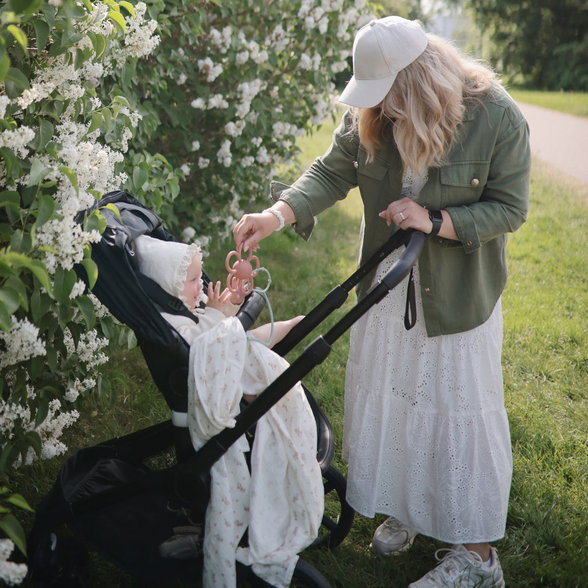 Mushie organic cotton muslin baby swaddle blanket, soft & breathable.