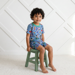 Two-piece pajama set with short sleeve top and matching shorts in Astro Shredderz print