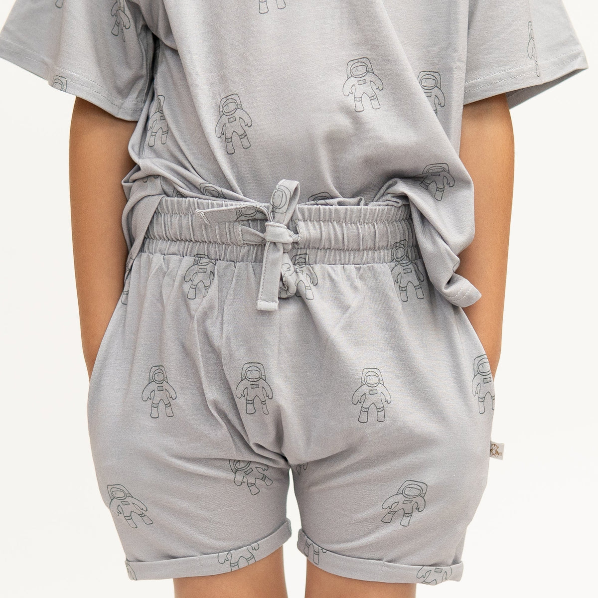 Harem shorts with an astronauts print, elastic drawstring waistband, and side pockets