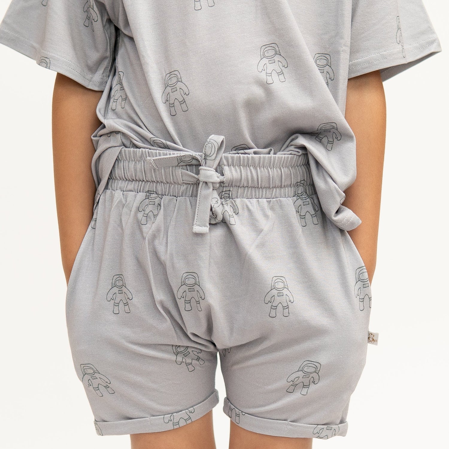 Harem shorts with an astronauts print, elastic drawstring waistband, and side pockets