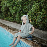 Mushie organic baby Bear Poncho Towel, cozy hooded bath wrap.