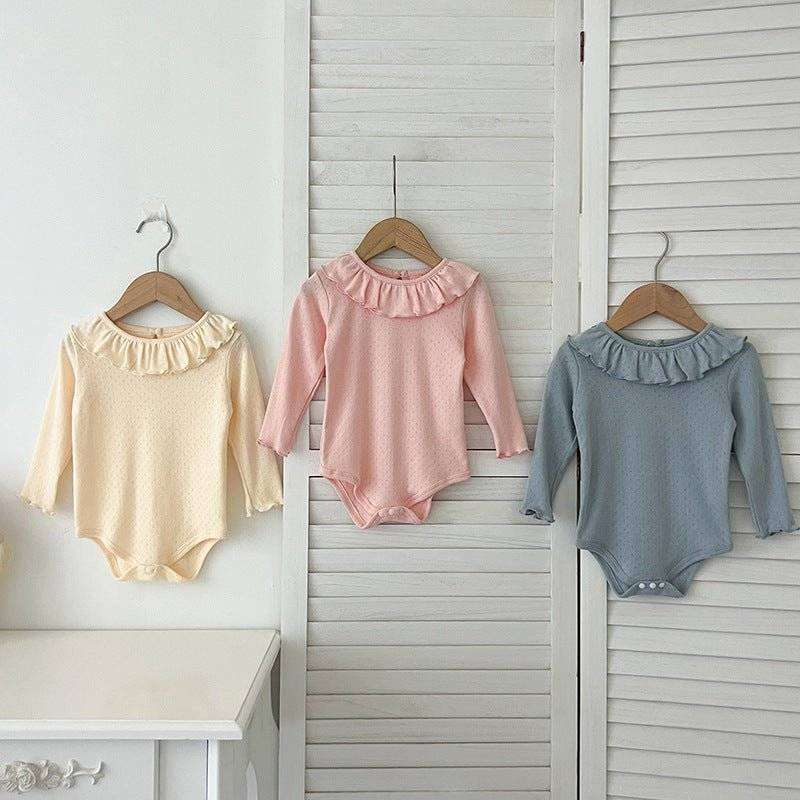 Baby GirlsThis baby girl's long-sleeved bodysuit features a charming scalloped neckline and is available in a variety of colors and sizes. Its adorable hollow-out pattern addsEveretts Place: Online Boutique 