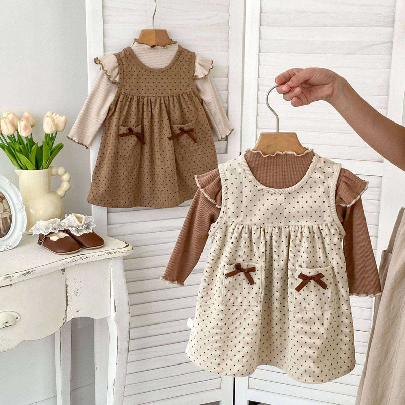 Girls Long SleevesDesigned with both comfort and style in mind, this knitted top is perfect for baby girls. The classic dots pattern adds a timeless touch to any outfit, while the lonEveretts Place: Online Boutique 