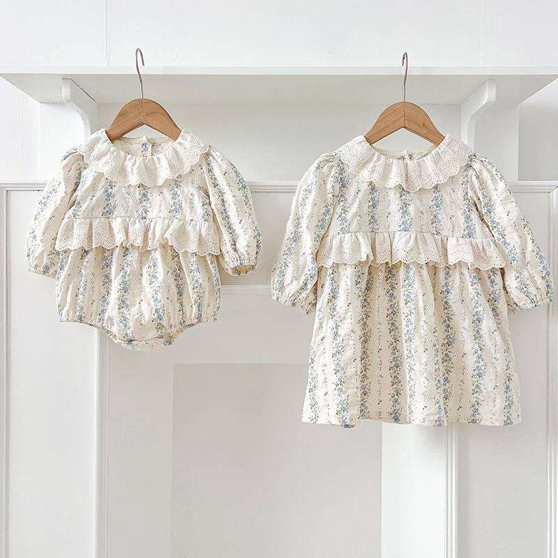 Baby Kids GirlsThis baby dress or bodysuit features long sleeves and a beautiful blue floral pattern. Made from high-quality materials, this dress is both comfortable and stylish fEveretts Place: Online Boutique 