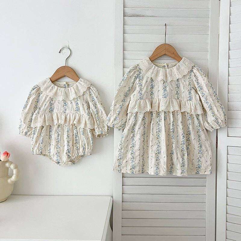 Baby Kids GirlsThis baby dress or bodysuit features long sleeves and a beautiful blue floral pattern. Made from high-quality materials, this dress is both comfortable and stylish fEveretts Place: Online Boutique 