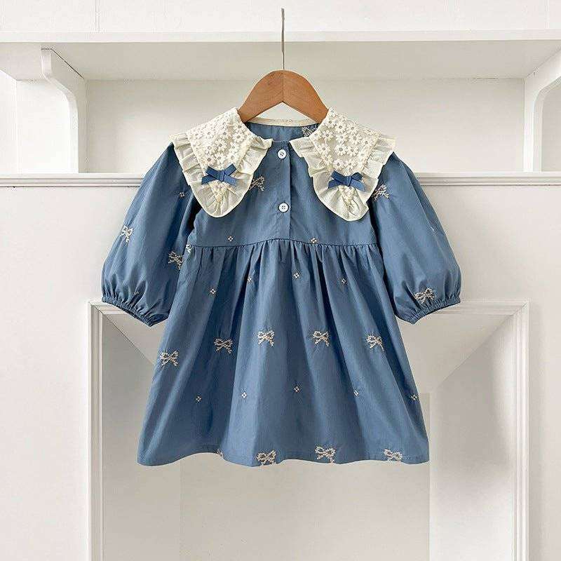 Girls long sleeves shirt with bows and embroidery pattern.