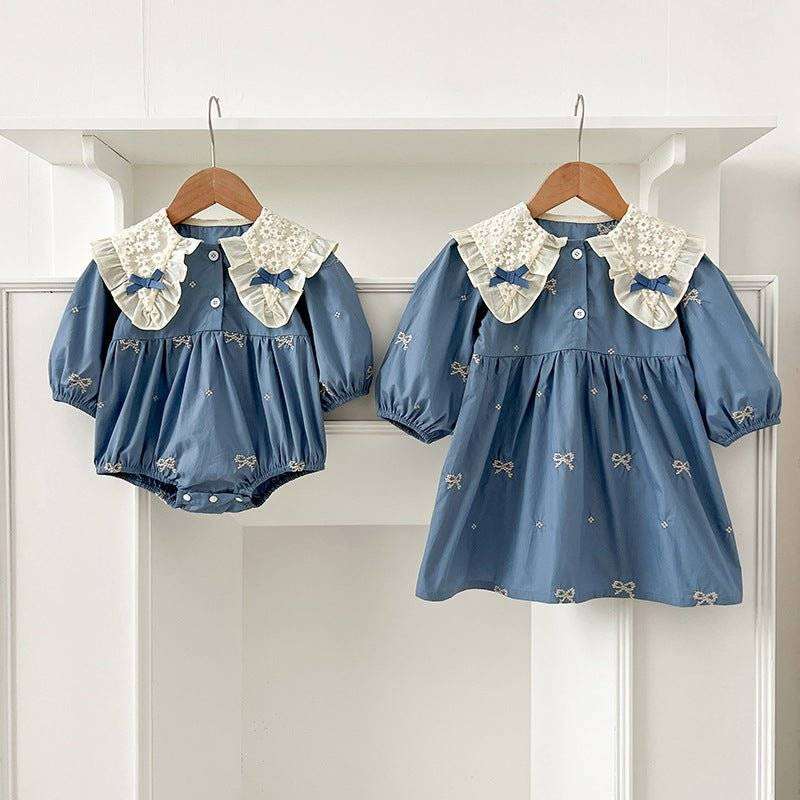 Girls' long sleeves shirt with bows and embroidery, lace collar, blue color.