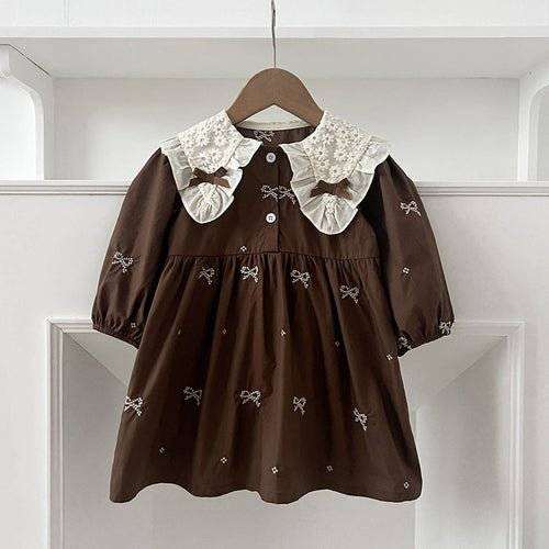 Girls long sleeves shirt with bows embroidery pattern.