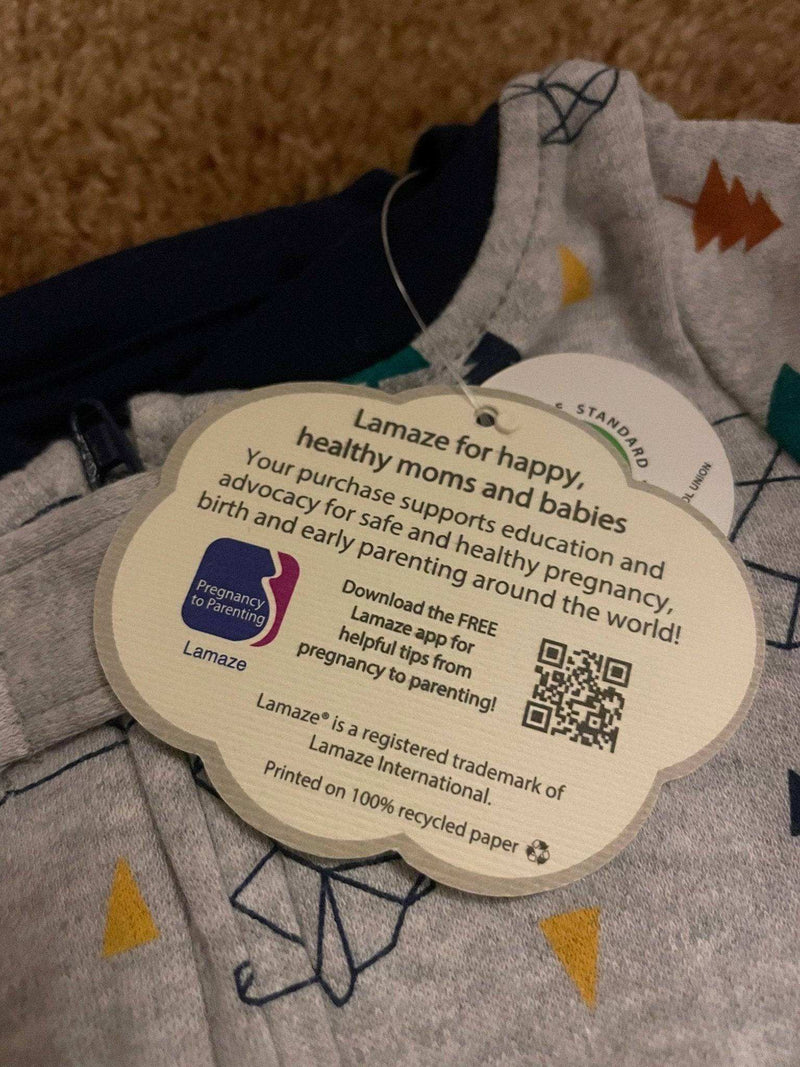 100% organic Lamaze baby sleepers with tag promoting healthy parenting.